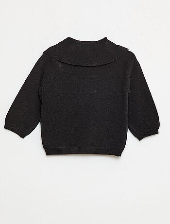 Pull en maille avec un large nœud fantaisie devant