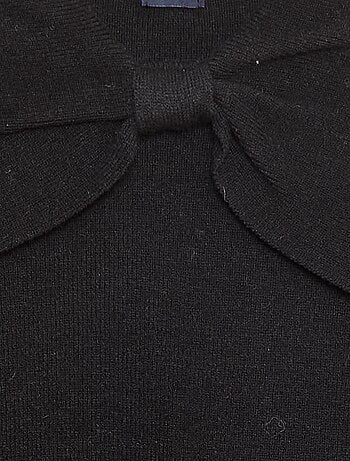 Pull en maille avec un large nœud fantaisie devant