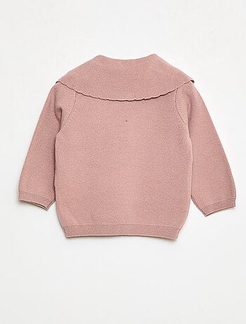 Pull en maille avec un large nœud fantaisie devant