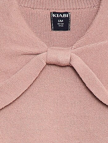 Pull en maille avec un large nœud fantaisie devant