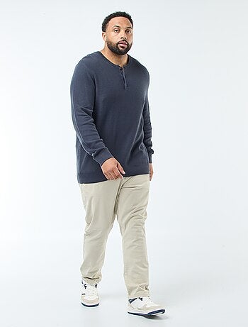 Pull en maille piquée avec col rond boutonné