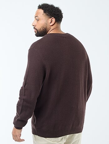 Pull en maille piquée avec col rond boutonné