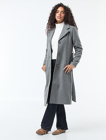 Pull en maille torsade et col montant