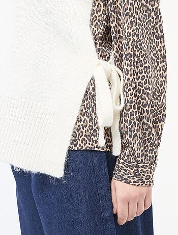 Pull sans manches à nouer sur les côtés