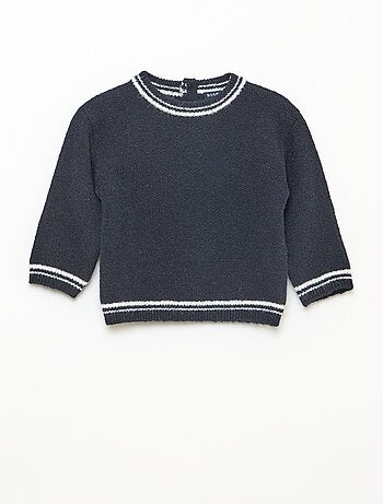 Pull uni avec bords contrastés