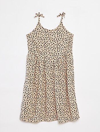 Robe fluide à fines bretelles et motif all over