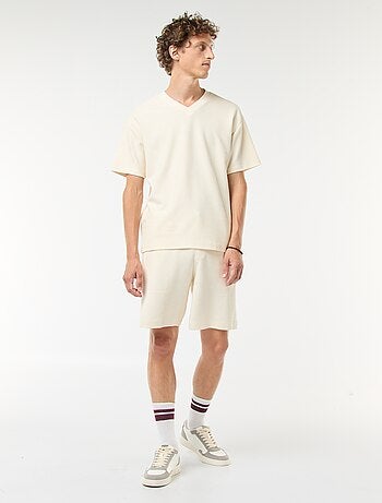 Short de sport avec poches en maille fantaisie