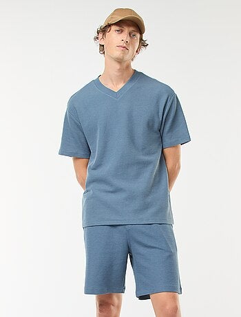 Short de sport avec poches en maille fantaisie