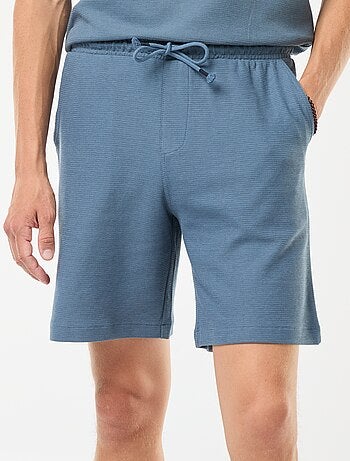 Short de sport avec poches en maille fantaisie