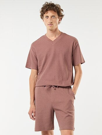 Short de sport avec poches en maille fantaisie