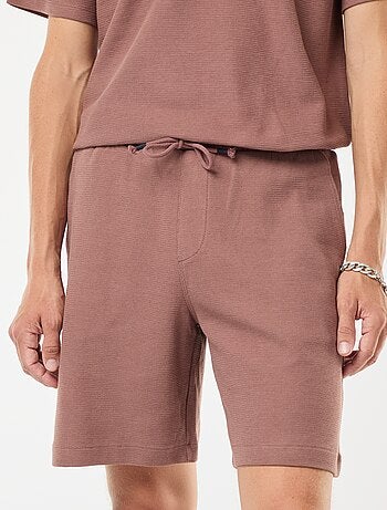 Short de sport avec poches en maille fantaisie