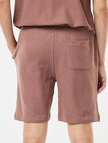 Short de sport avec poches en maille fantaisie