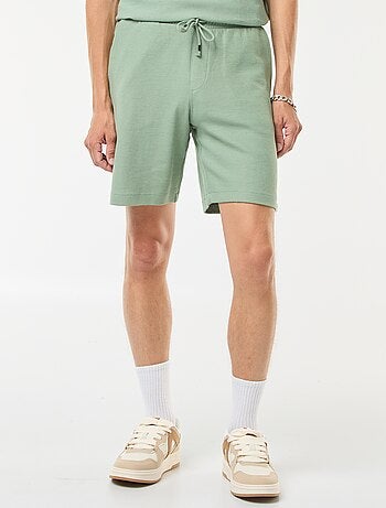 Short de sport avec poches en maille fantaisie