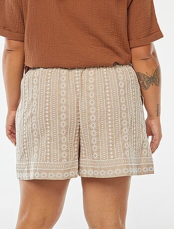Short large à motifs brodés avec ceinture intégrée