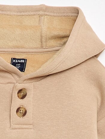 Sweat à capuche avec boutons et doublure chaude