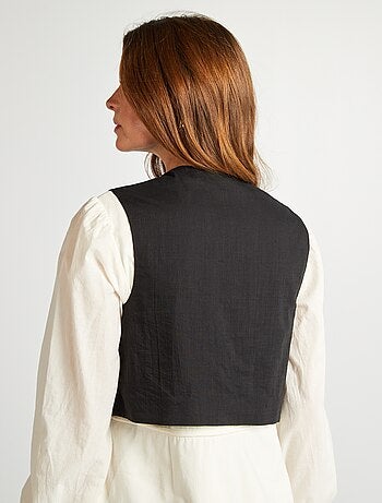 Veste sans manches avec motifs en studs