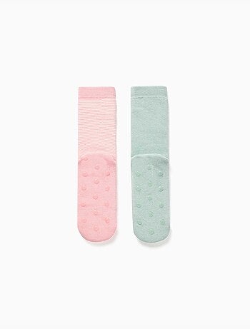 2 chaussettes en éponge antidérapantes avec rayures/fleur