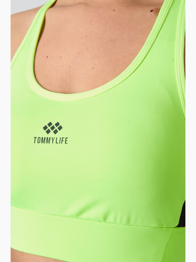 Aansluitend mouwloos crop sporttop tommy Lindegroen - Kiabi
