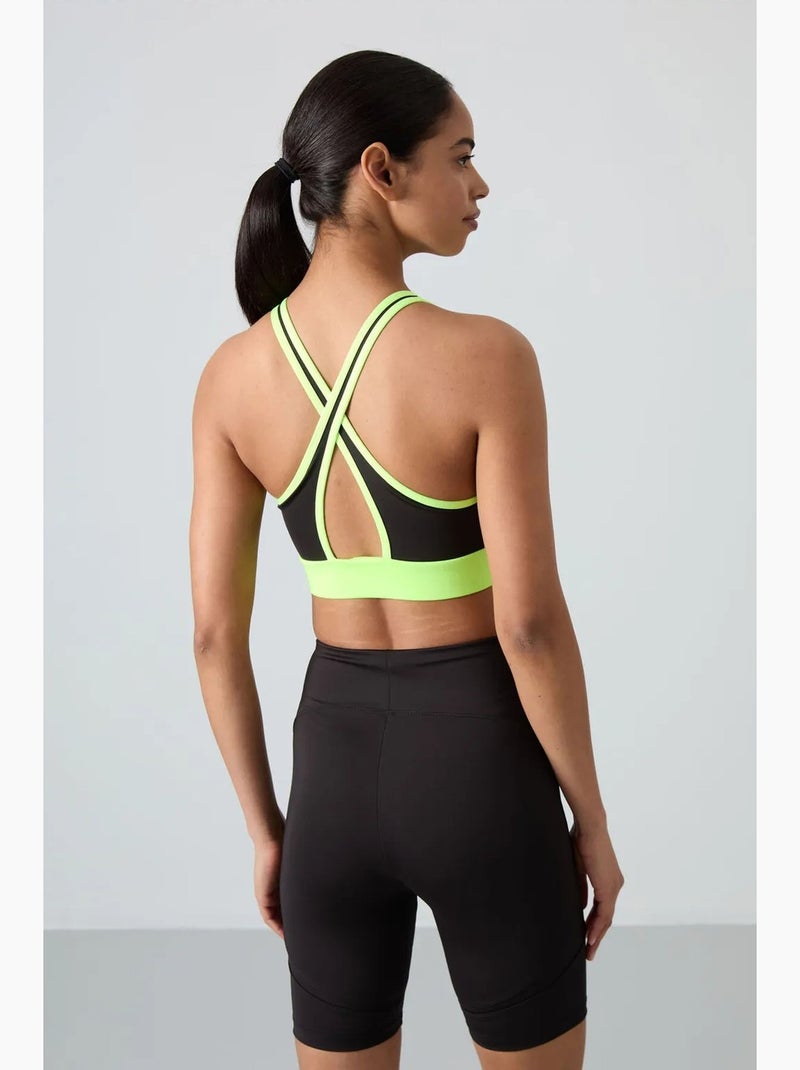 Aansluitend mouwloos crop sporttop tommy Lindegroen - Kiabi