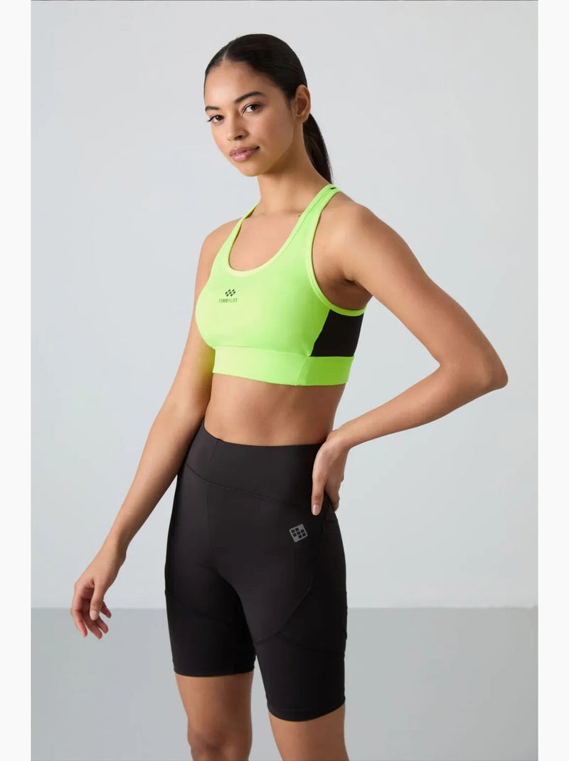 Aansluitend mouwloos cropped sporttop tommy Lindegroen - Kiabi