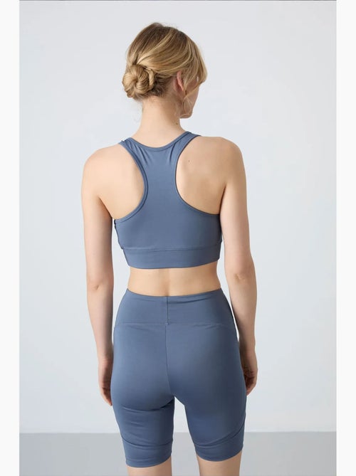 Aansluitend mouwloos cropped sporttop tommy - Kiabi
