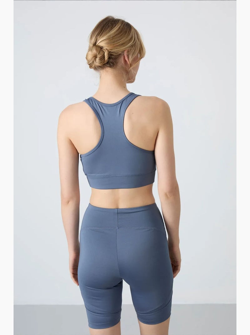 Aansluitend mouwloos cropped sporttop tommy Marineblauw - Kiabi
