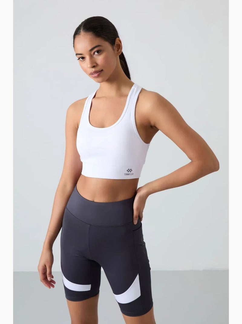 Aansluitend mouwloos cropped sporttop tommy Wit Blauw - Kiabi