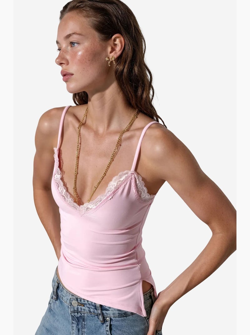 Aansluitende cropped cami-top met borduursel busem Roze - Kiabi