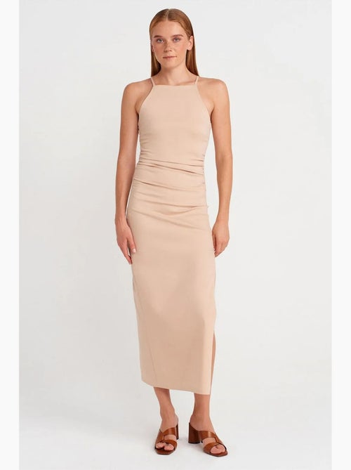 Aansluitende midi-jurk met halter en split dilvin - Kiabi Aansluitende midi-jurk met halter en split dilvin - Kiabi