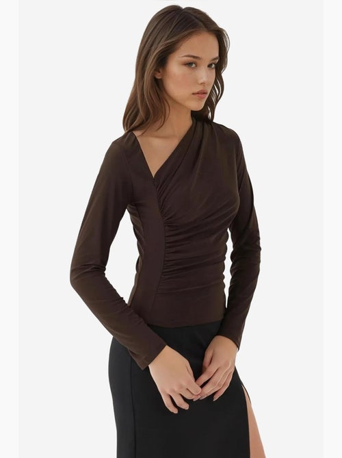Asymmetrische kraag en gebreide top met lange mouwen hiccup - Kiabi Asymmetrische kraag en gebreide top met lange mouwen hiccup - Kiabi