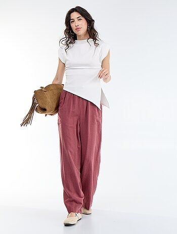 Asymmetrische mouwloze top