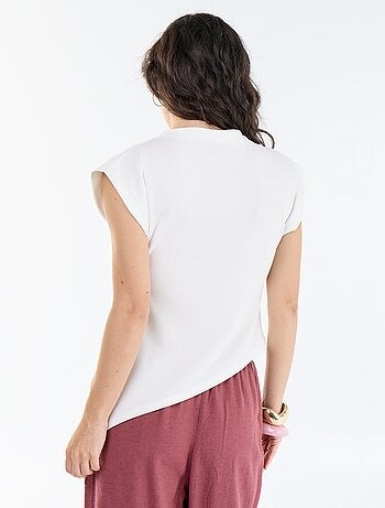 Asymmetrische mouwloze top