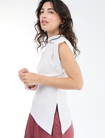 Asymmetrische mouwloze top
