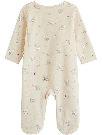 Babypyjama van fluweel met een opening in de vorm van de melkwegbrug.