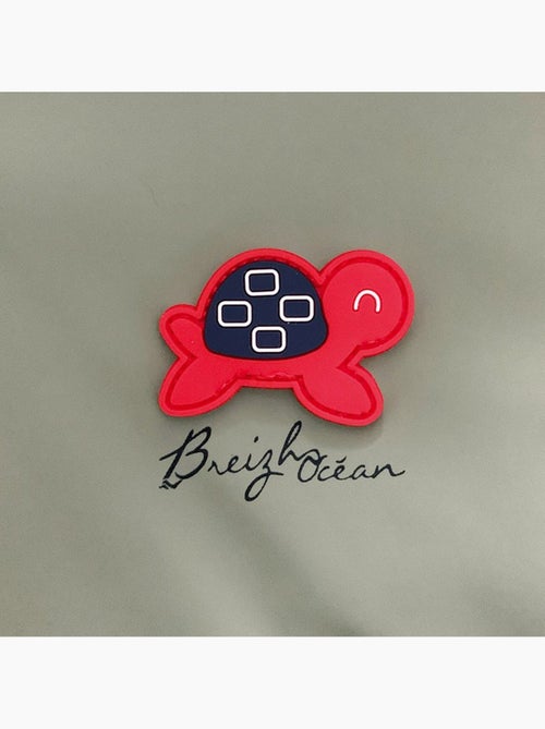 Babyregenjas met capuchon 'Breizh Ocean', gestreepte binnenponcho met borduurwerk - Kiabi Babyregenjas met capuchon 'Breizh Ocean', gestreepte binnenponcho met borduurwerk - Kiabi