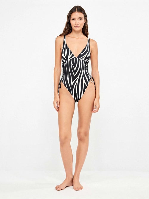 Badpak met diepe halsuitsnijding in dierenprint zebra - Kiabi Badpak met diepe halsuitsnijding in dierenprint zebra - Kiabi