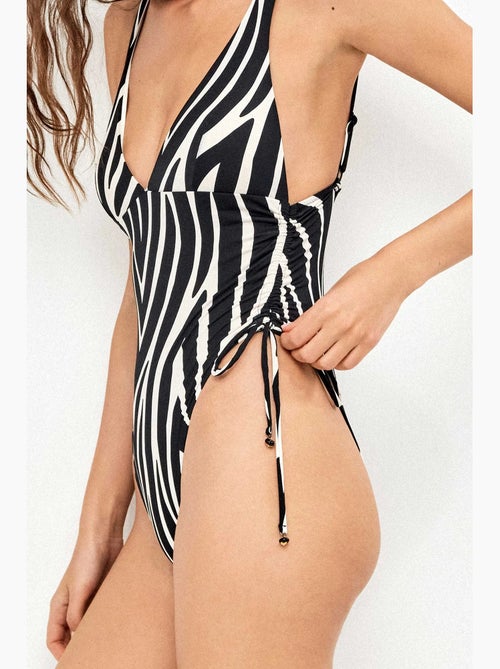 Badpak met diepe halsuitsnijding in dierenprint zebra - Kiabi Badpak met diepe halsuitsnijding in dierenprint zebra - Kiabi