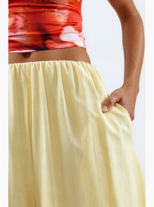Ballonbroek met elastische tailleband busem - Kiabi Ballonbroek met elastische tailleband busem - Kiabi