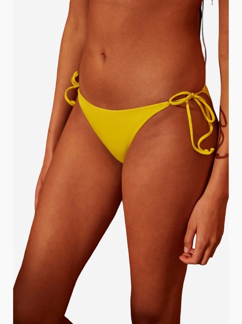 Basic bikinibroekje met strikbandjes penti - Kiabi Basic bikinibroekje met strikbandjes penti - Kiabi