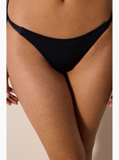 Basic string bikinibroekje penti - Kiabi Basic string bikinibroekje penti - Kiabi