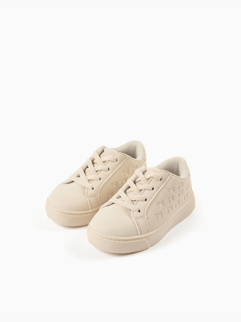 Baskets avec nœuds en relief et lacets élastiques Beige - Kiabi