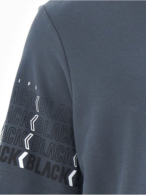 Bedrukt t-shirt met polokraag tommy - Kiabi Bedrukt t-shirt met polokraag tommy - Kiabi