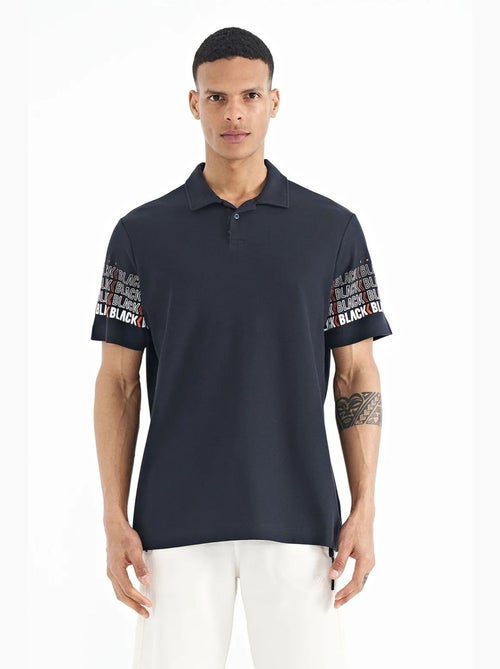 Bedrukt t-shirt met polokraag tommy - Kiabi Bedrukt t-shirt met polokraag tommy - Kiabi