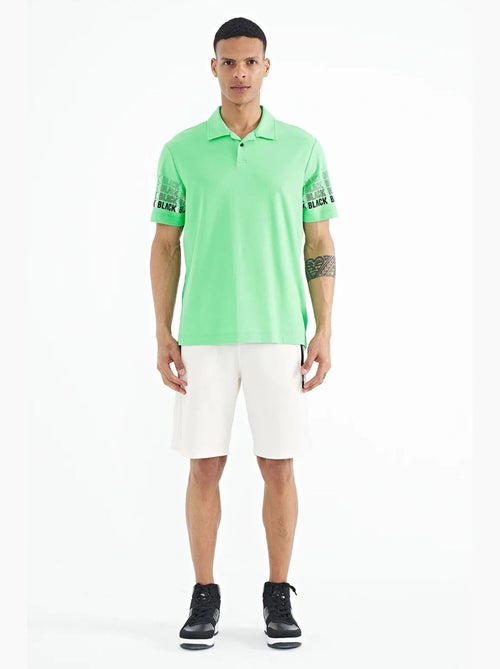 Bedrukt t-shirt met polokraag tommy - Kiabi Bedrukt t-shirt met polokraag tommy - Kiabi