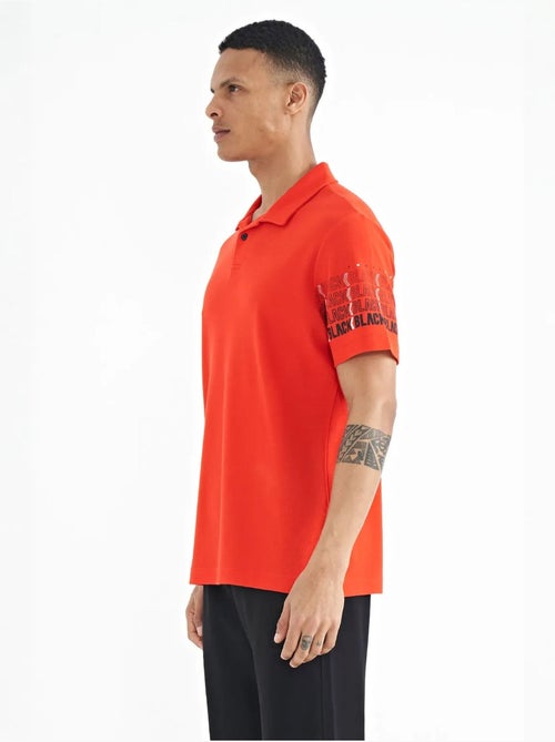 Bedrukt t-shirt met polokraag tommy - Kiabi Bedrukt t-shirt met polokraag tommy - Kiabi