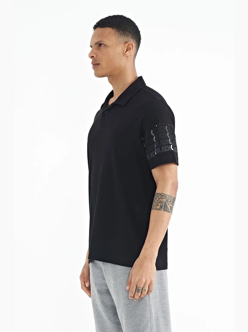 Bedrukt t-shirt met polokraag tommy Zwart - Kiabi