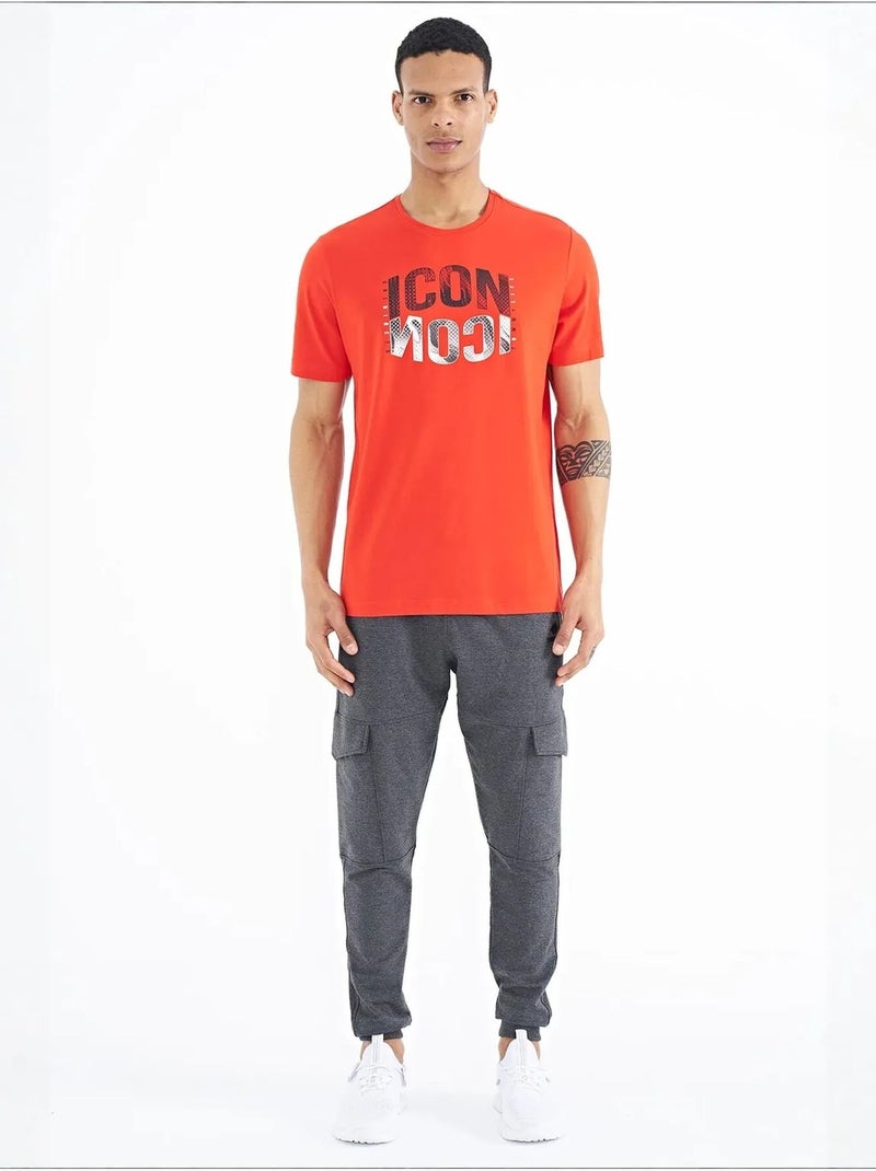 Bedrukt t-shirt met ronde hals en patch tommy Oranje - Kiabi
