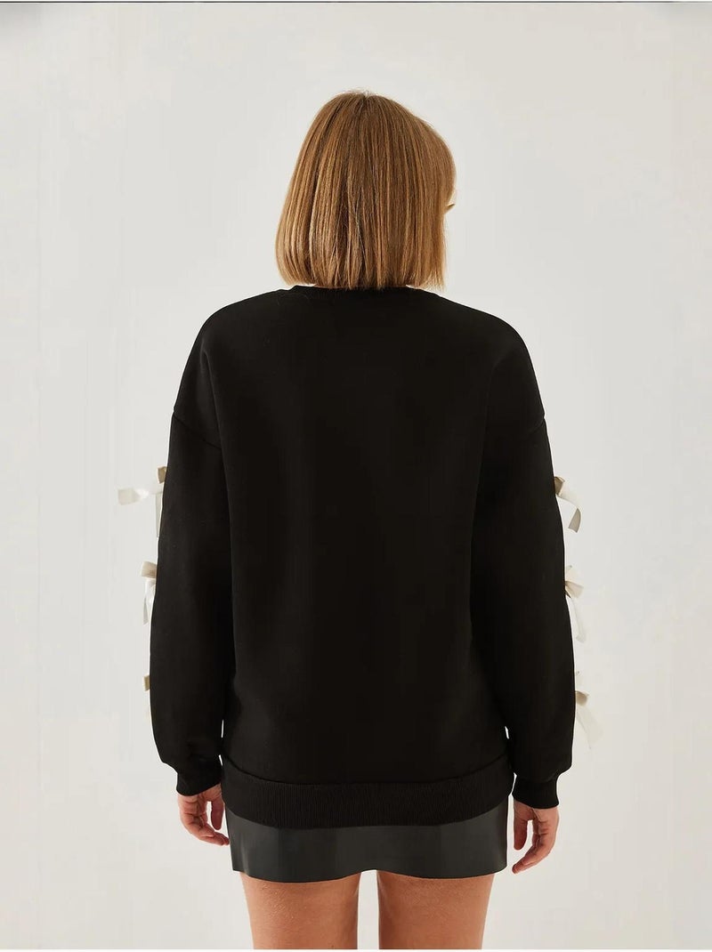 Bianco drie-draads geborstelde sweatshirt met strikmouwen lucci Zwart - Kiabi