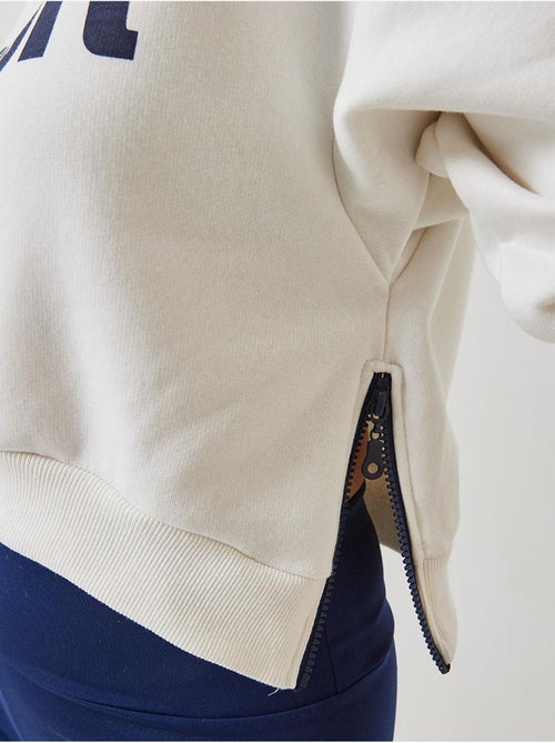 Bianco drie-garen geborstelde cropped sweatshirt met zijrits lucci - Kiabi