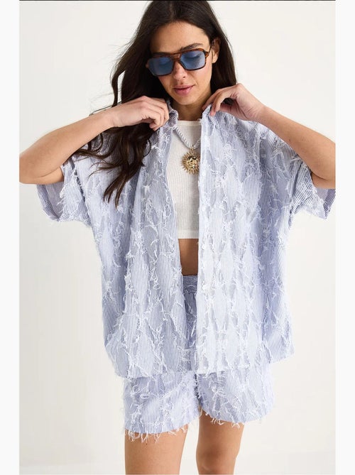 Bianco gestreepte oversized blouse met franjes, zakdetail en elastische tailleband shorts set lucci - Kiabi